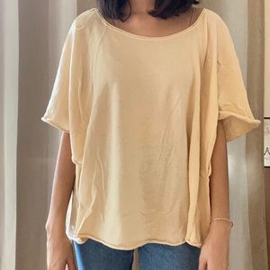 yellowy-beige poncho style sweater